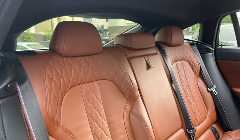 BMW X6 M50I 2022 lleno